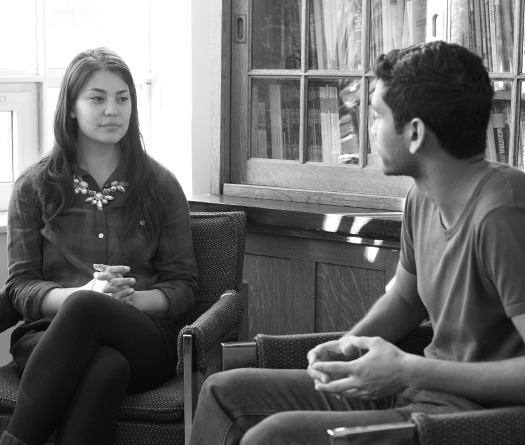 McGill students having conversation in an office setting to illustrate peer support, wellness and student advising