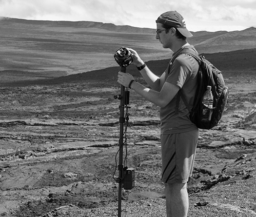 Student researcher with special camera studying geology through experiential learning at McGill
