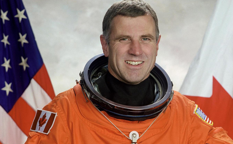Headshot of Dave Williams in a space suit